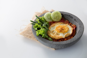 egg served with hot chili sauce