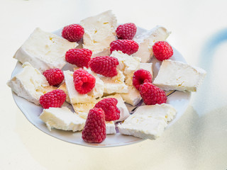 Cheese and raspberries