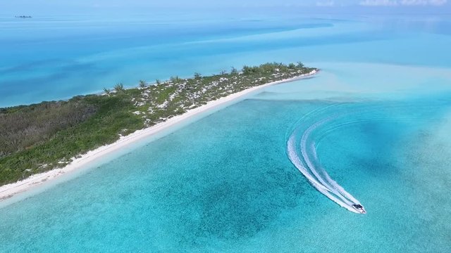 Aerial shot of boat in Crystal Clear Bahamian Waters