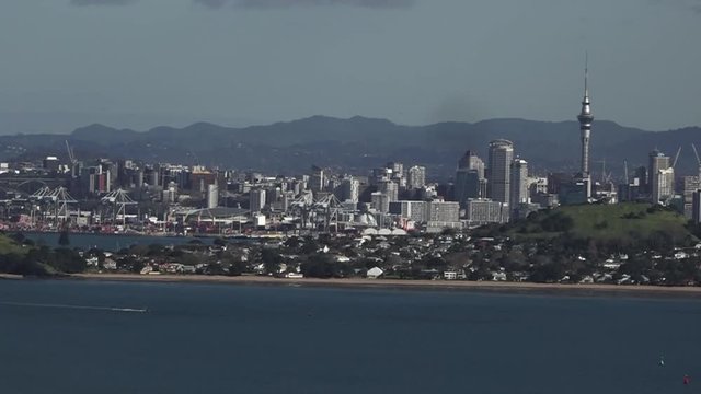 Auckland city skyline as view from Rangitoto Island, New Zealand.