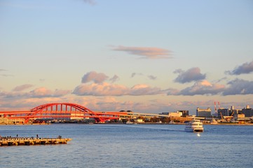 Fototapeta na wymiar The cityscape of harbor at sunset in Kobe, Japan 