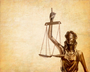 Statue of justice on old paper background, law concept