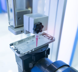 Robot holding glue syringe Injection