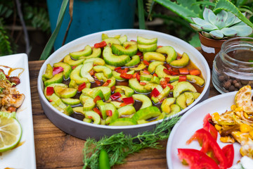 Asian cucumber red bell pepper and chilly hot pepper salad with soy sauce. Authentic Thai food menu. Raw vegan vegetarian healthy food