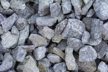 Gravel base of the structure as a background