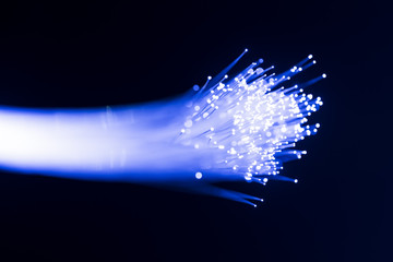 optical fibres dinamic flying from deep on technology background