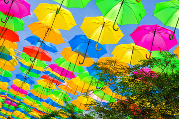 Fototapeta na wymiar Colorful hanging umbrellas in a outdoor plaza in Miami