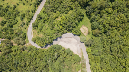 Italy. Route to Mandrioli mountain pass. Vertical view of bend like a s