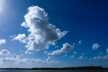 Fototapeta na wymiar Magnificent white cloud in blue sky. Australia.