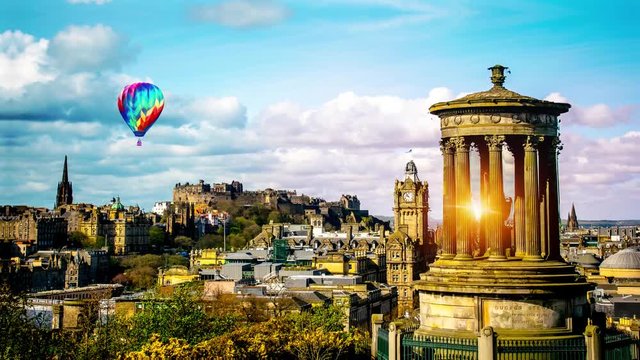 Edinburgh skyline as seen from Calton Hill Edinburgh Dugald Stewart monument with Edinburgh Castle on background and balloon flyby 