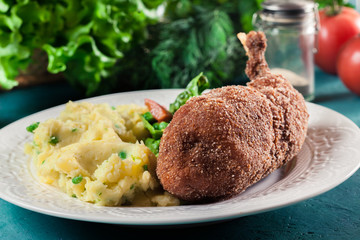 Chicken Kiev, breaded chicken breast