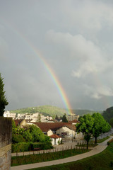 rainbow with a city skyline in Cahors