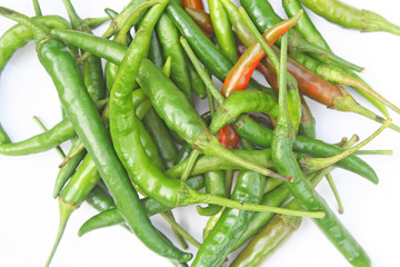 Top view long fed pepper chili on white background