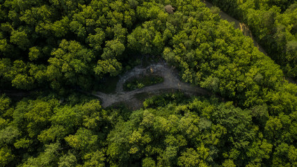 Russian Forest And Mountains Under Blue Sky By Aerial Drone. Stunning Aerial Drone Stock Footage of South russian Forest And Mountains Under Blue Sky