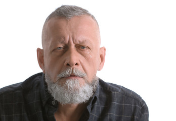 Senior man in state of depression indoors