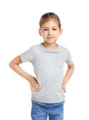Fototapeta premium Little girl in t-shirt on white background. Mockup for design