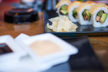 Sushi avocado and kale and wasabi on plate