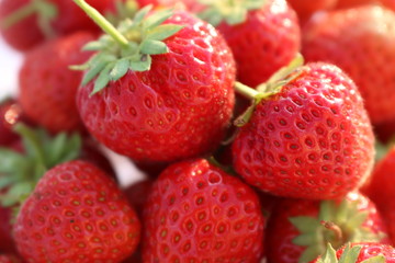 Strawberry ripe red delicious appetizing berry lot close-up