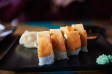 Sushi avocado and kale and wasabi on plate