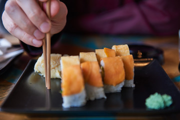 Sushi avocado and kale and wasabi on plate