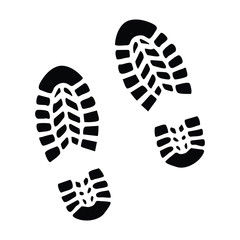 A black and white silhouette of some boot prints