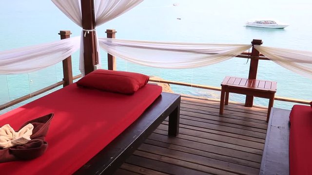 Massage table overlooking the sea. Spa massage room on the tropical beach in island Koh Phangan, Thailand