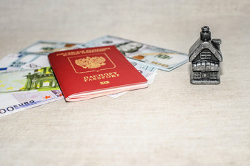 Passport, money and home - the concept of buying a property