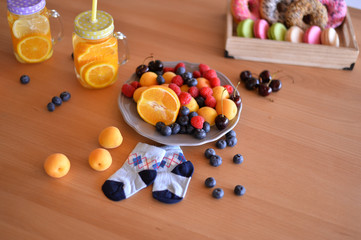 Healthy breakfast. A lot of berries. Apricot berry and donuts. A lot of food. European breakfast.  