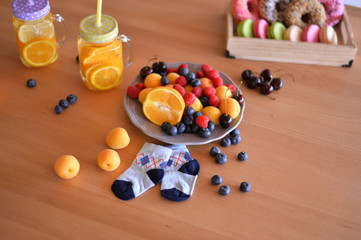 Healthy breakfast. A lot of berries. Apricot berry and donuts. A lot of food. European breakfast.  