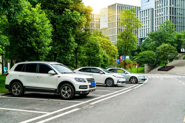 Outdoor parking lots and modern urban buildings 