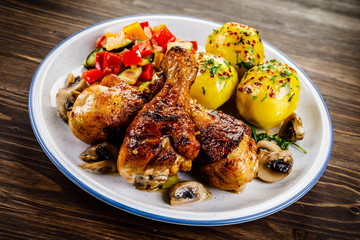 Roast drumsticks with potatoes