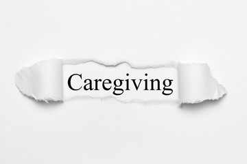 Caregiving on white torn paper