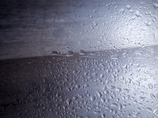 Rain drops on the glass, background, Natural Pattern of raindrops isolated on cloudy background