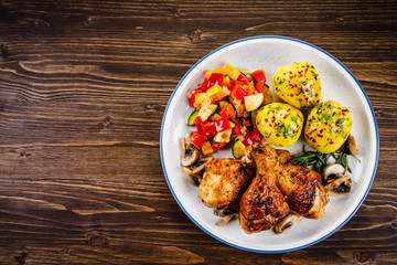 Roast drumsticks with potatoes