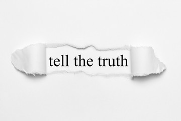 tell the truth on white torn paper