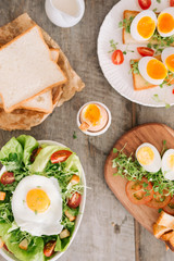 High Angle View of a Nutritious Vegetable Salad with Boiled Egg Slices, Served on a White Plate on Top of a Wooden Table