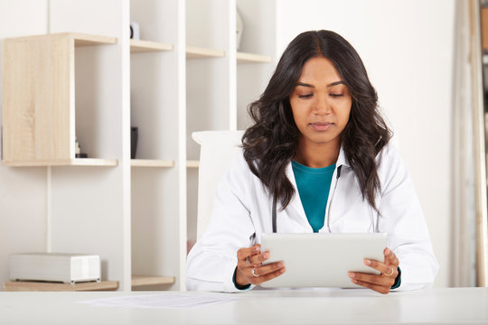 Female Doctor Working In Her Studio