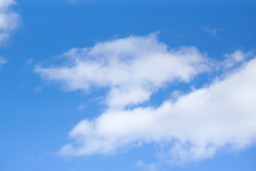 White clouds against a blue sky