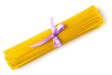 Bunch of spaghetti tied with a ribbon, on a white background.