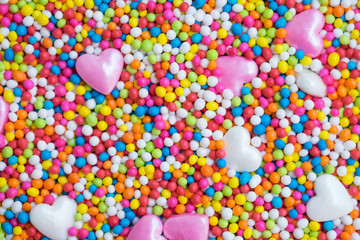 Abstract colorful rainbow sugar and sweet heart shape texture beautiful background for valentine day and love concept.