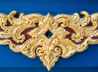 Traditional Thai pattern of the golden stucco.