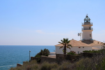 Fototapeta na wymiar Lighthouse on the mediterranean coast
