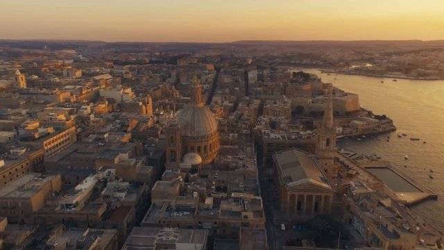 Aerial shot rotating around an iconic Dome in Valletta Malta
