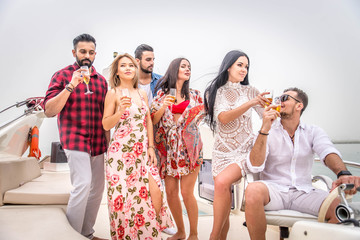 People celebrating on a yacht
