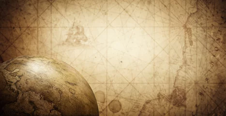 Foto op Canvas Ancient old globe on the vintage map background. Selective focus. Retro style. Science, education, travel, vintage background. History and geography team. © Tryfonov