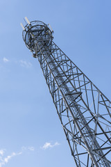 Telecommunication transmitter on metal construction.