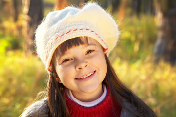 smiling girl in autumn