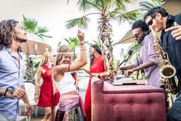 Friends making party in a lounge bar