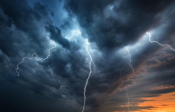 Lightning thunderstorm flash over the night sky. Concept on topic weather, cataclysms (hurricane, Typhoon, tornado)