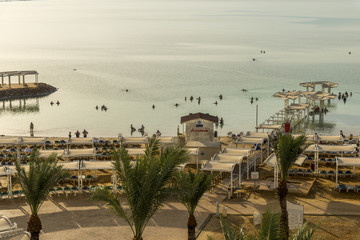 Fototapeta premium People bathing in the dead sea